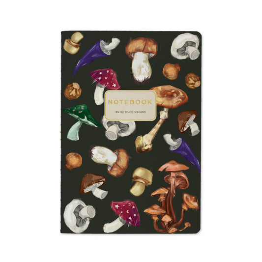Mushrooms on green journal